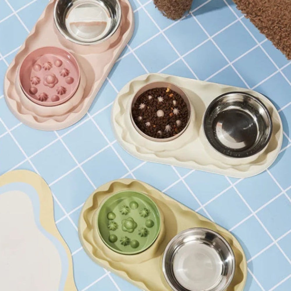 Double gamelle Bofélin avec bol anti-glouton en relief et bol en inox amovible pour chat, disponible en rose, blanc et vert.