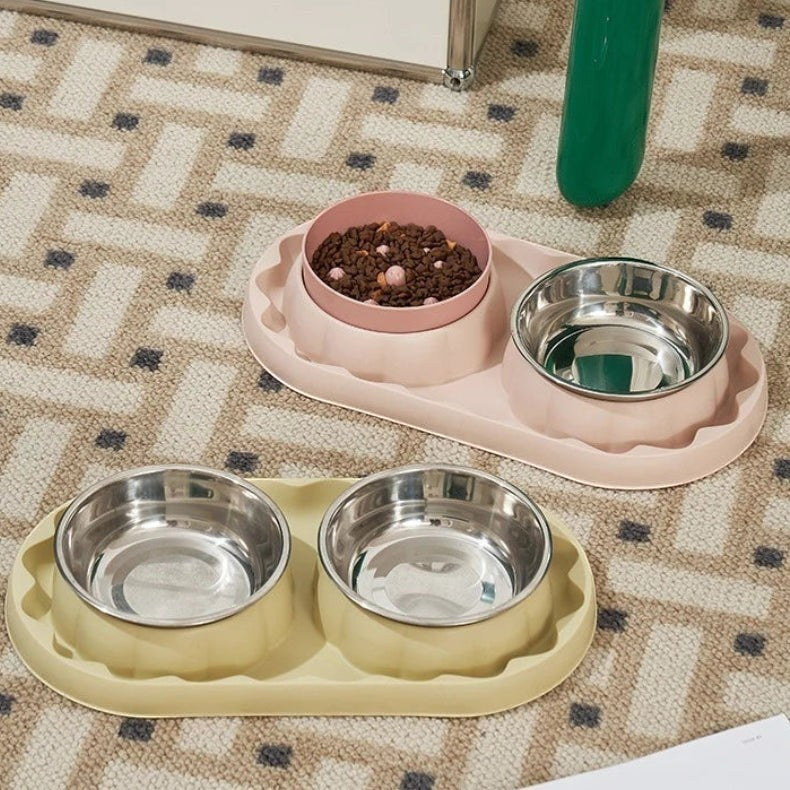 Double gamelle Bofélin avec bols en inox amovibles, incluant un bol anti-glouton rose et un bol classique jaune