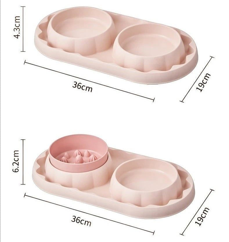 Double gamelle Bofélin rose pour chat avec un bol anti-glouton à reliefs et un bol lisse en inox amovible.