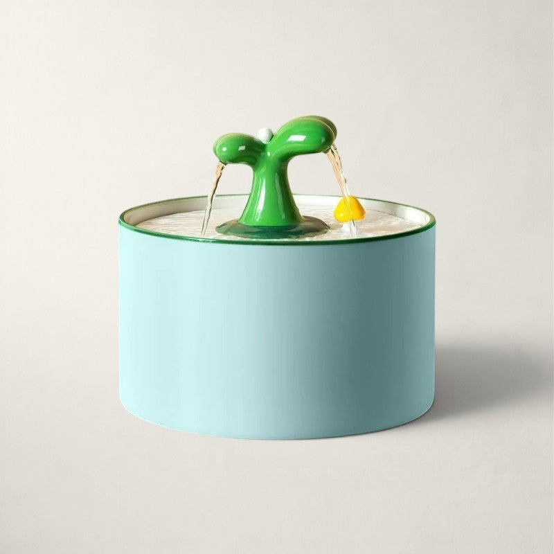 Fontaine à eau Bofélin en céramique bleu clair avec bec verseur vert en forme de plante pour chat