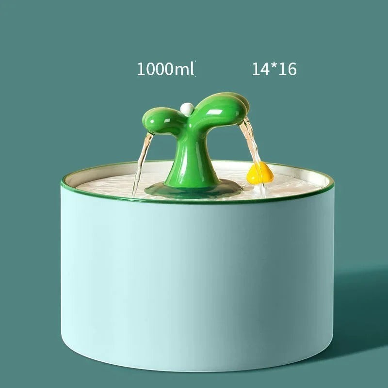 Fontaine à eau Bofélin en céramique bleu clair avec bec verseur en forme de plante verte pour chat
