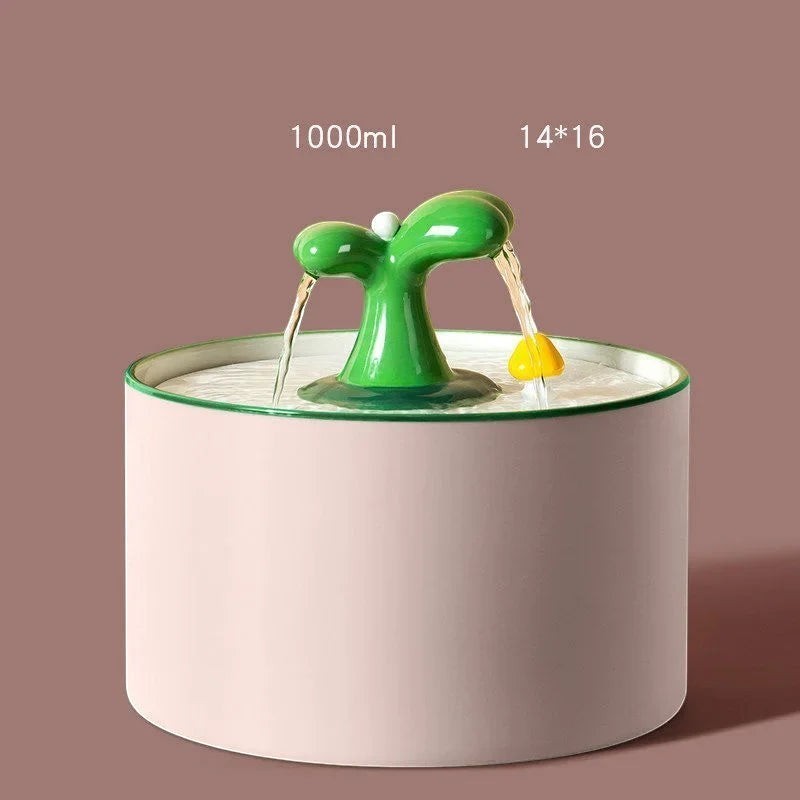 Fontaine à eau Bofélin en céramique rose et verte avec bec verseur en forme de plante pour chat
