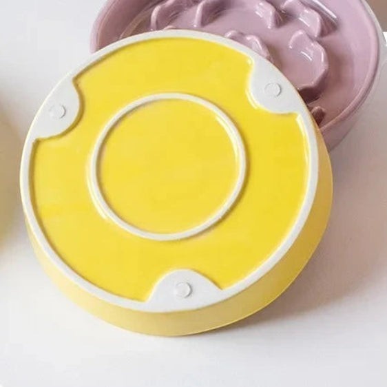 Gamelle anti-glouton Bofélin en céramique émaillée jaune et rose avec base surélevée stable