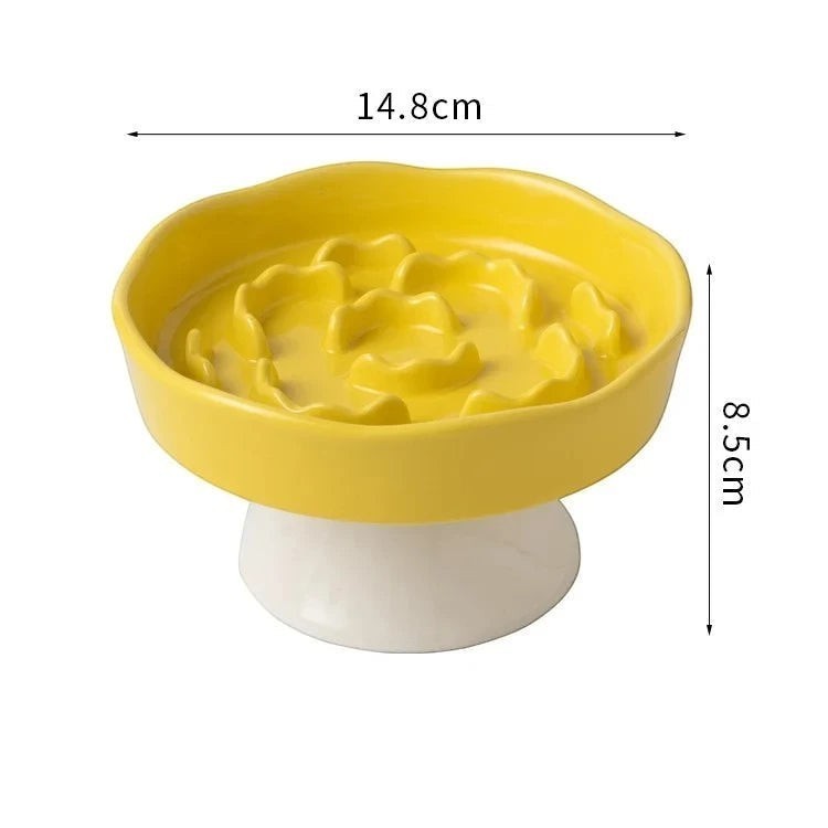 Gamelle anti-glouton Bofélin en céramique jaune avec relief en spirale sur pied pour ralentir la prise alimentaire