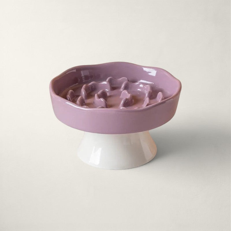 Gamelle anti-glouton Bofélin en céramique émaillée violette et blanche avec relief en spirale sur pied surélevé