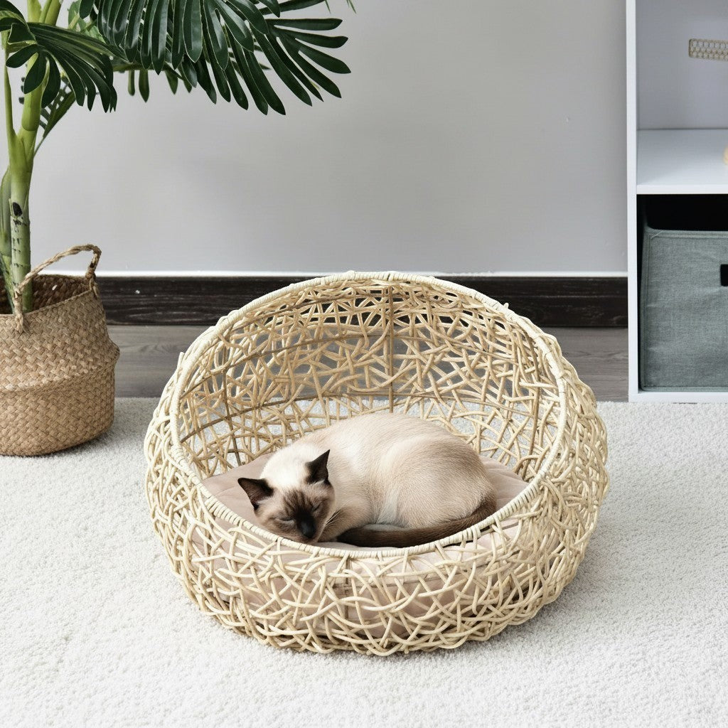 Lit niche Bofélin rond en rotin synthétique beige avec coussin confortable pour chat Image