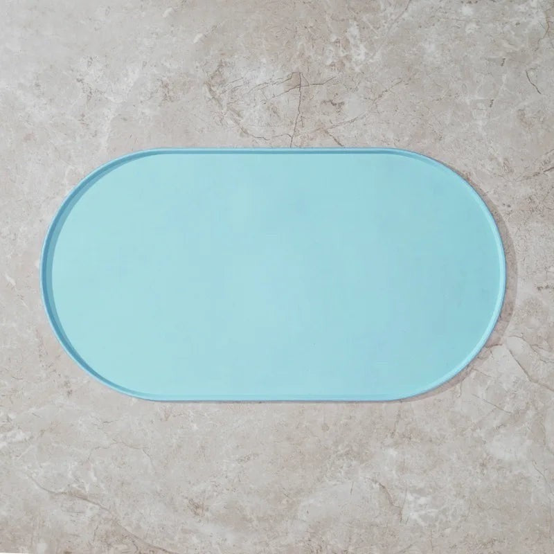 Tapis de gamelle Bofélin ovale en silicone bleu avec bords relevés anti-débordement pour protéger le sol