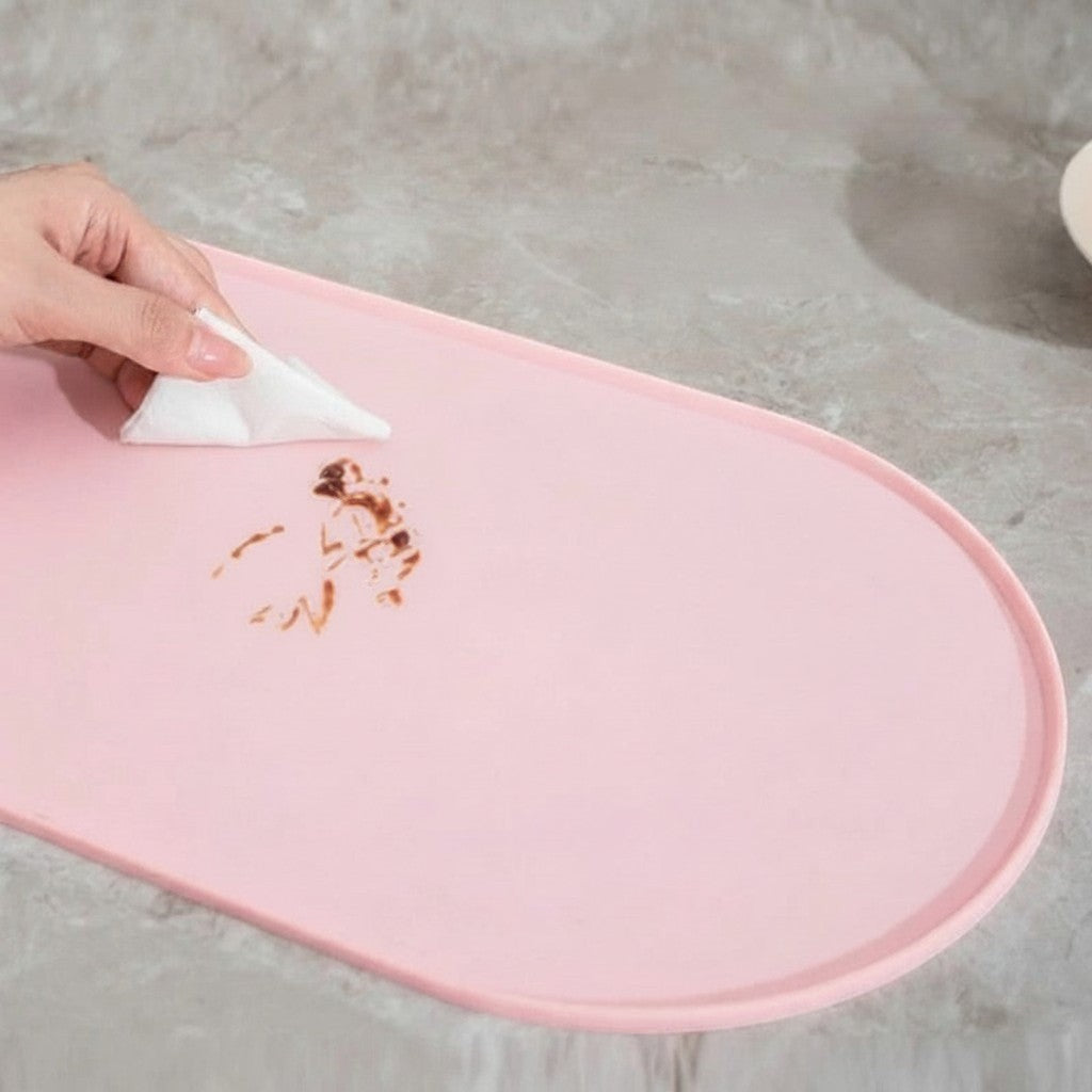 Tapis de gamelle Bofélin ovale en silicone rose antidérapant et imperméable pour protéger le sol